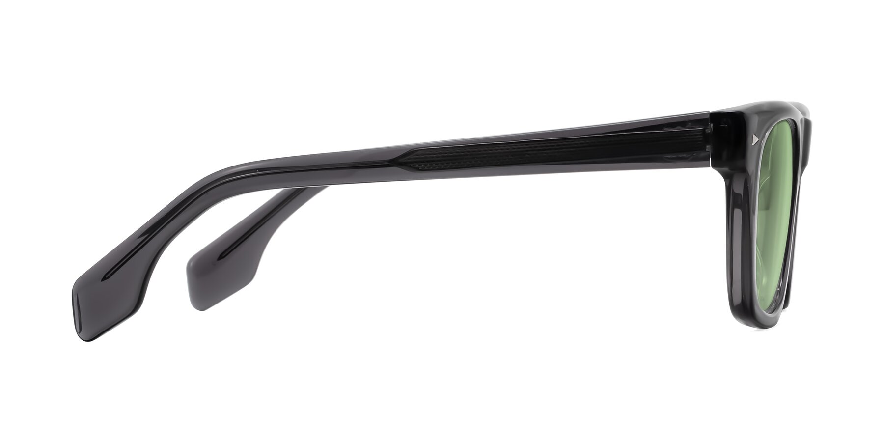 Side of Nesse in Transparent Gray with Medium Green Tinted Lenses