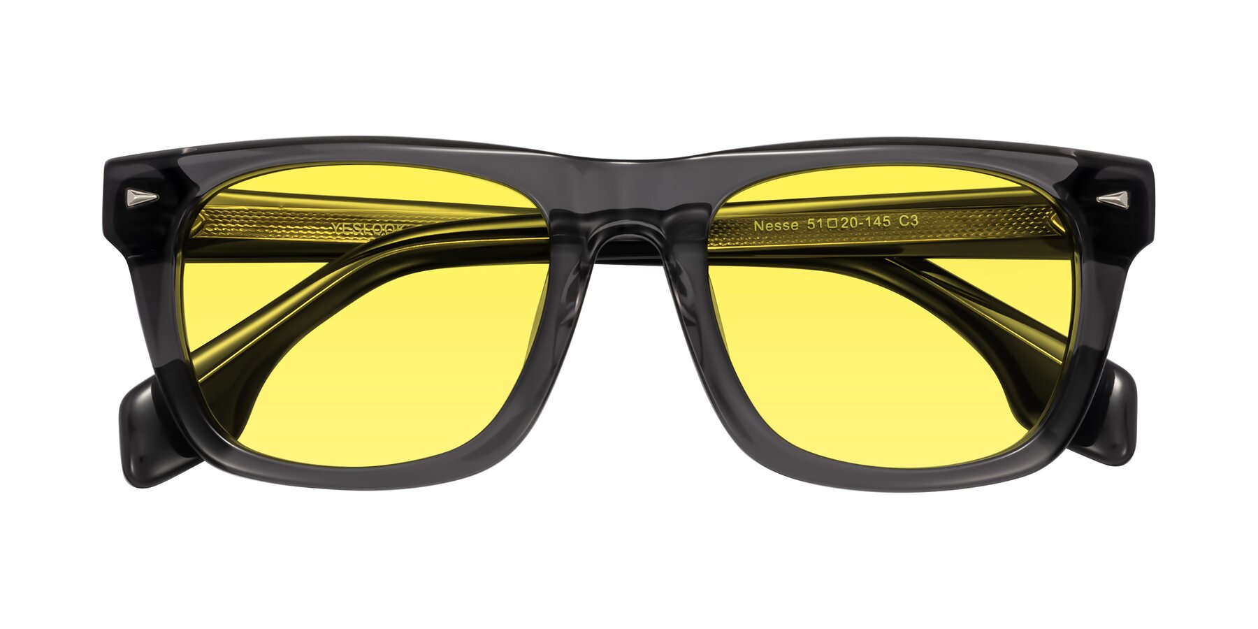 Folded Front of Nesse in Transparent Gray with Medium Yellow Tinted Lenses