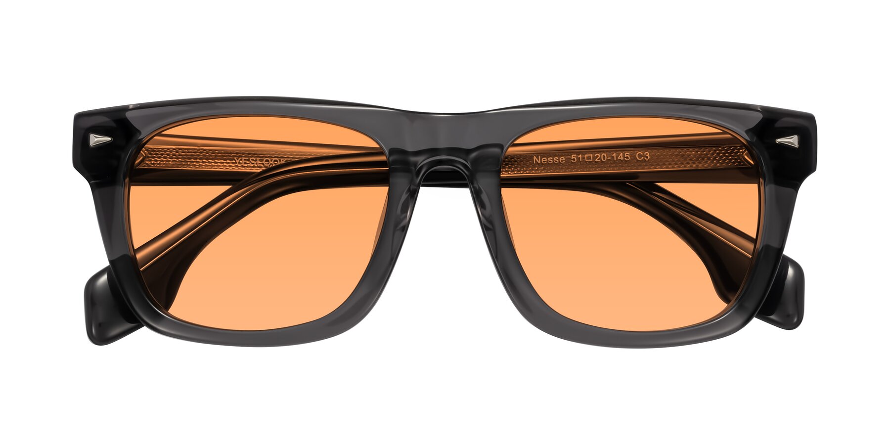 Folded Front of Nesse in Transparent Gray with Medium Orange Tinted Lenses