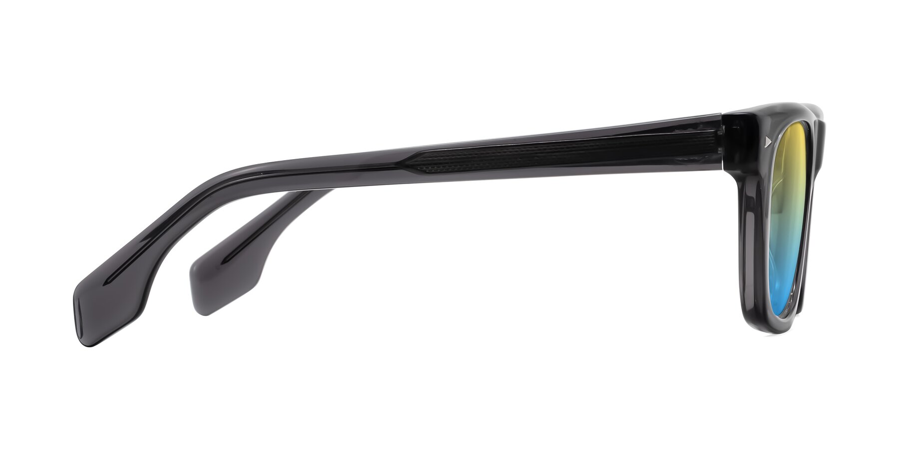 Side of Nesse in Transparent Gray with Yellow / Blue Gradient Lenses