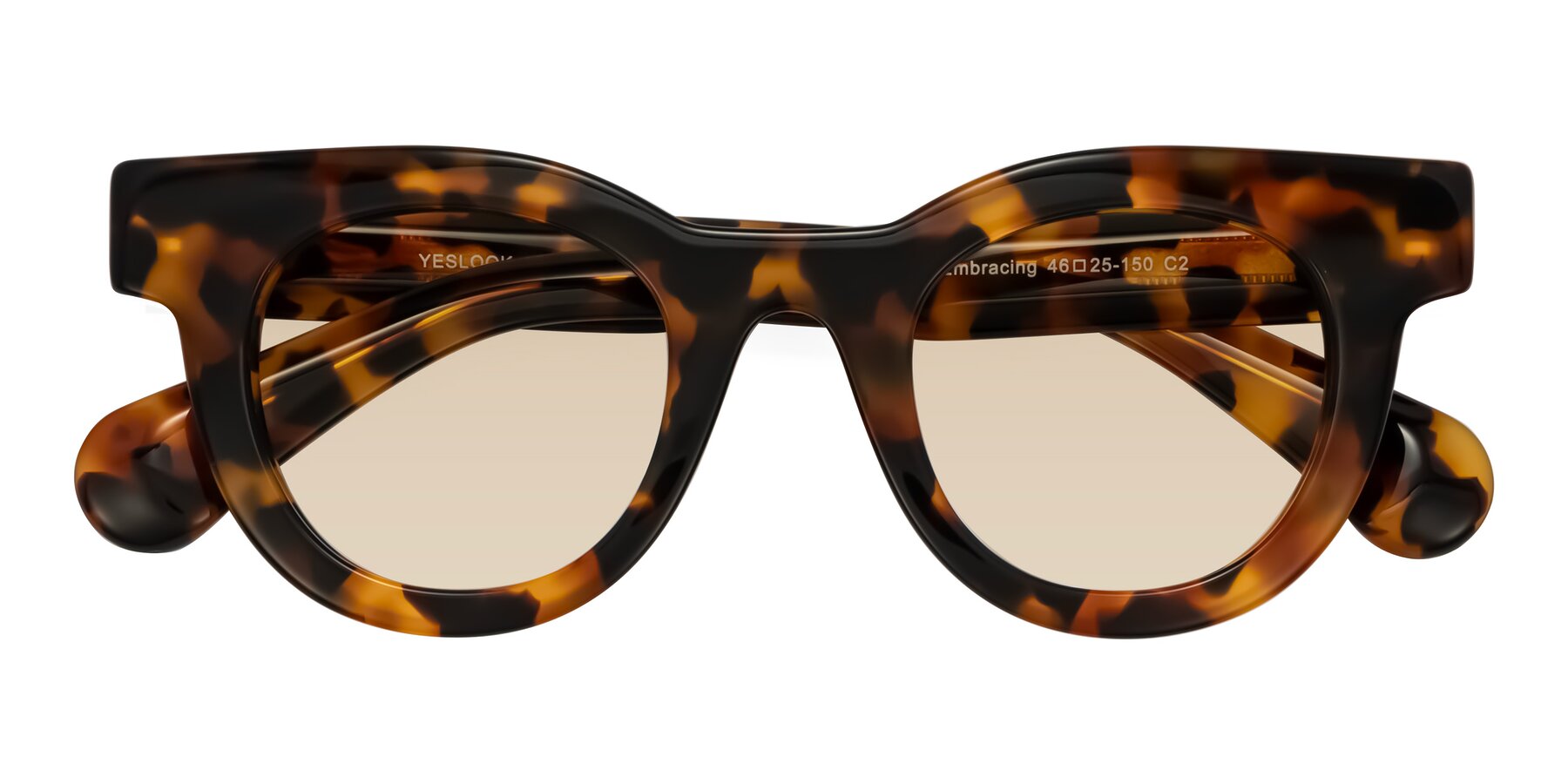 Folded Front of Embracing in Tortoise with Light Brown Tinted Lenses