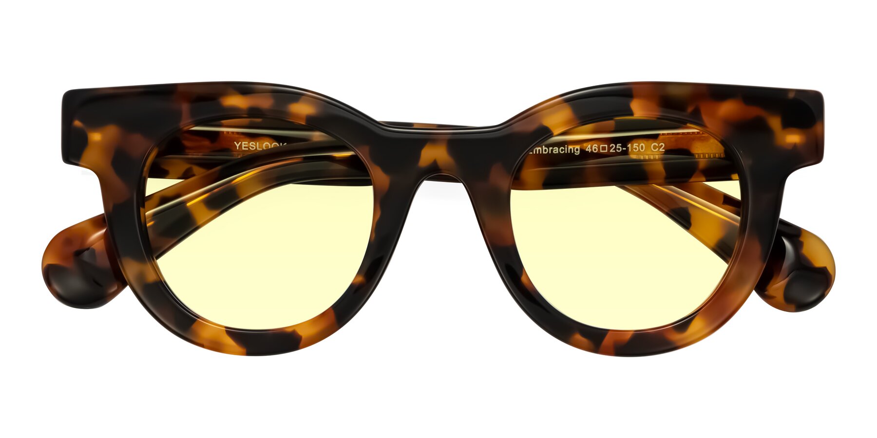 Folded Front of Embracing in Tortoise with Light Yellow Tinted Lenses