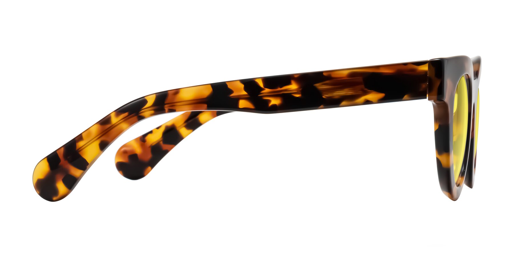 Side of Embracing in Tortoise with Medium Yellow Tinted Lenses