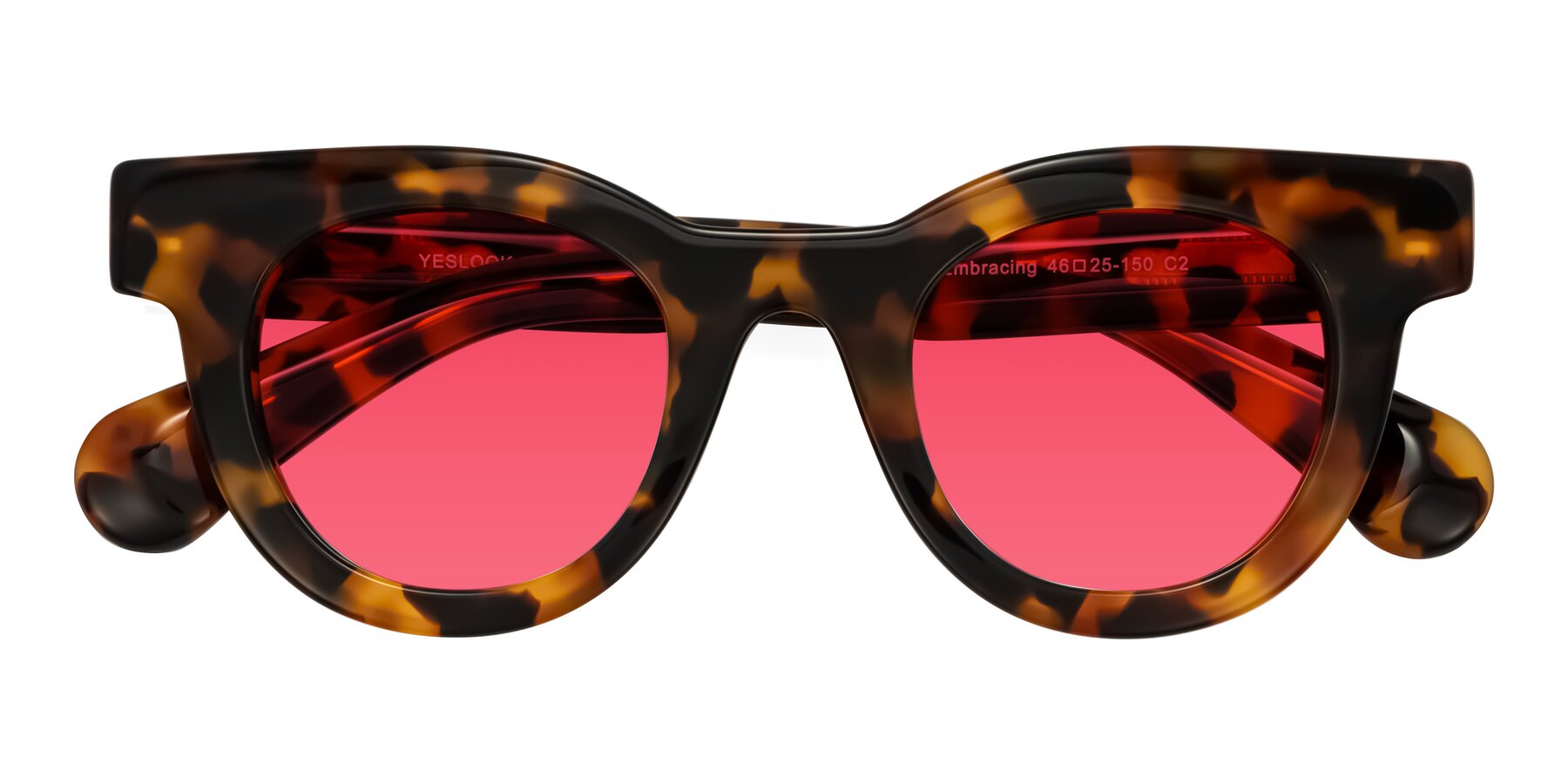 Folded Front of Embracing in Tortoise with Red Tinted Lenses