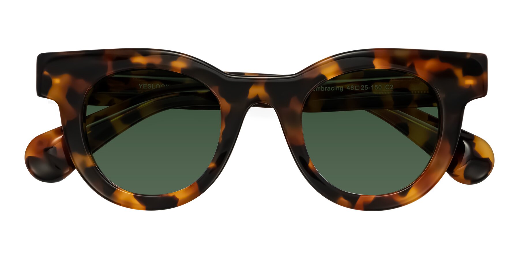 Folded Front of Embracing in Tortoise with Green Tinted Lenses