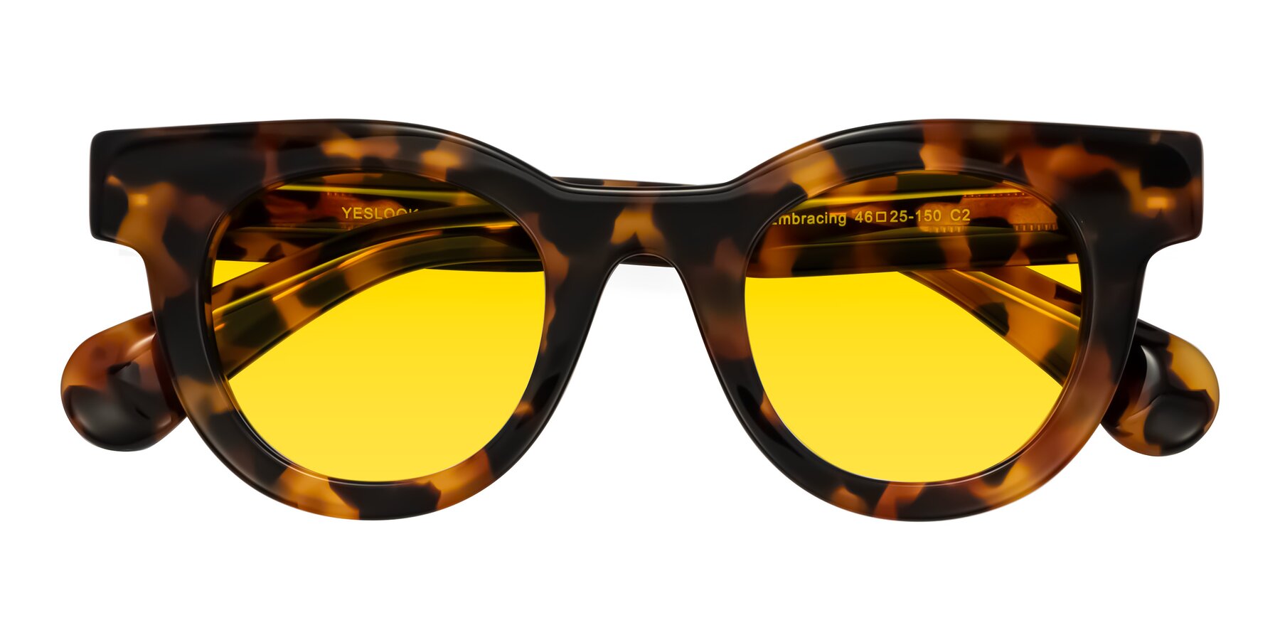 Folded Front of Embracing in Tortoise with Yellow Tinted Lenses