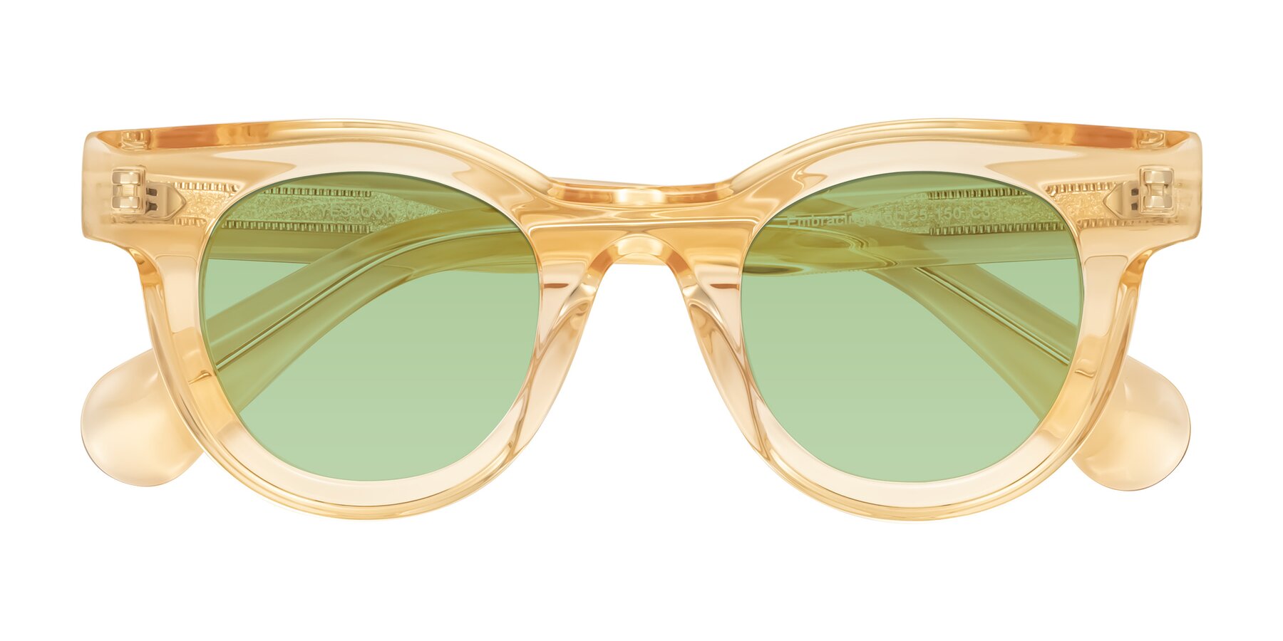 Folded Front of Embracing in Champagne with Medium Green Tinted Lenses