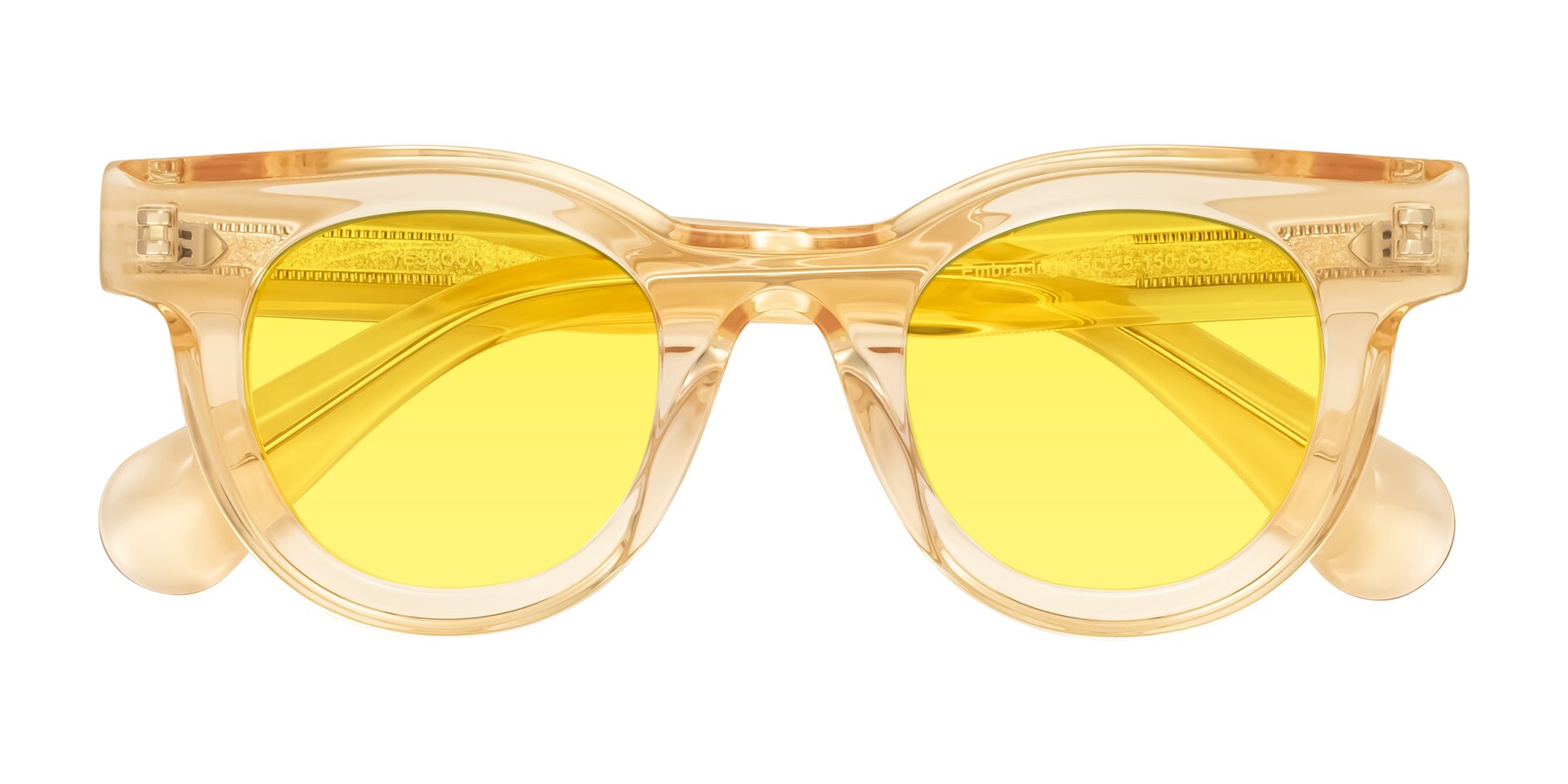 Folded Front of Embracing in Champagne with Medium Yellow Tinted Lenses
