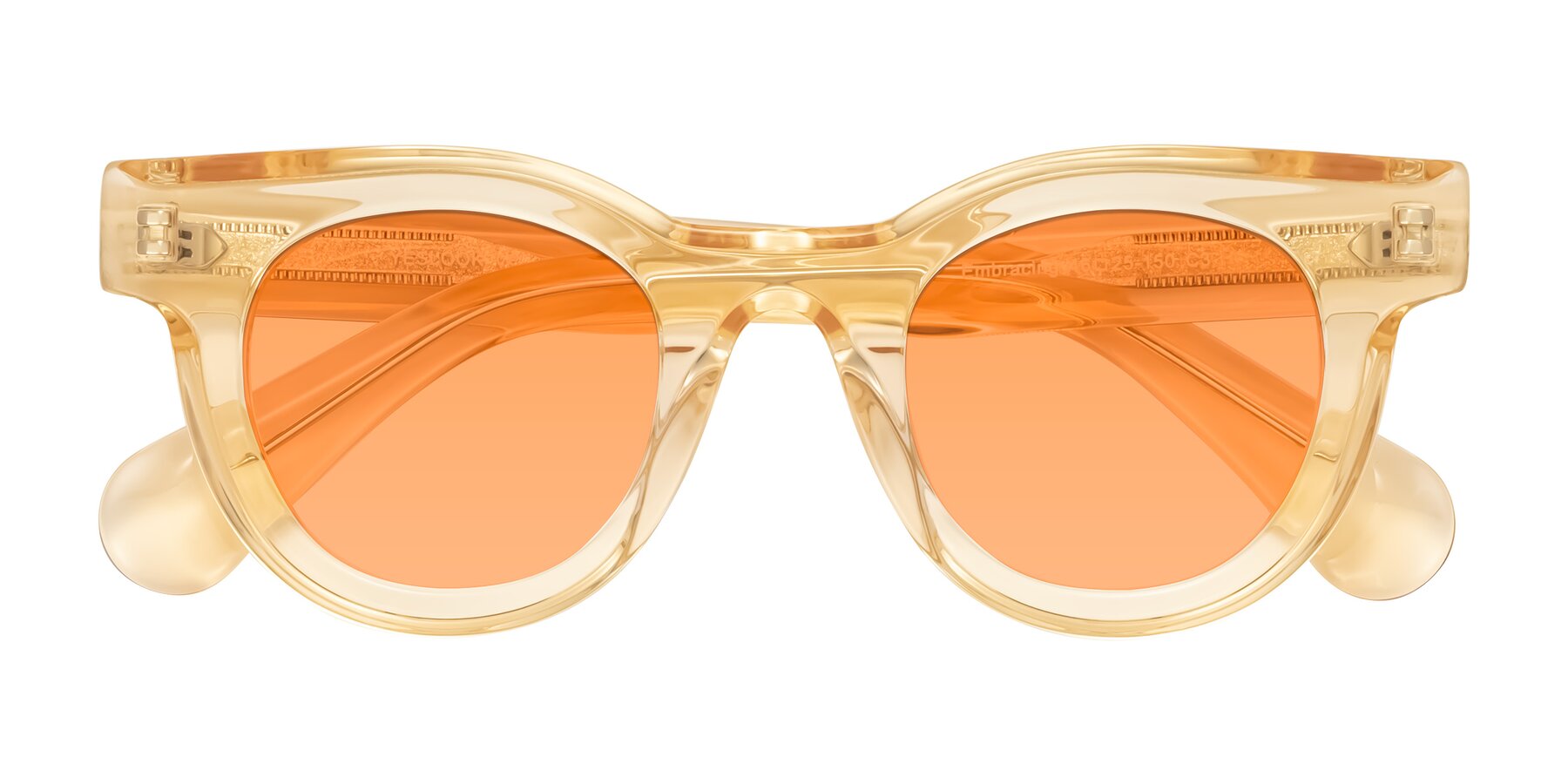 Folded Front of Embracing in Champagne with Medium Orange Tinted Lenses