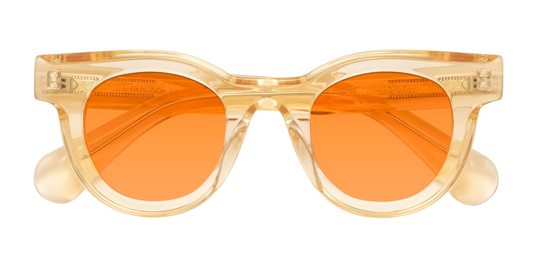 Folded Front of Embracing in Champagne with Orange Tinted Lenses