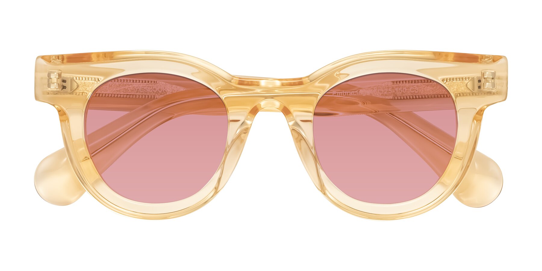 Folded Front of Embracing in Champagne with Medium Garnet Tinted Lenses