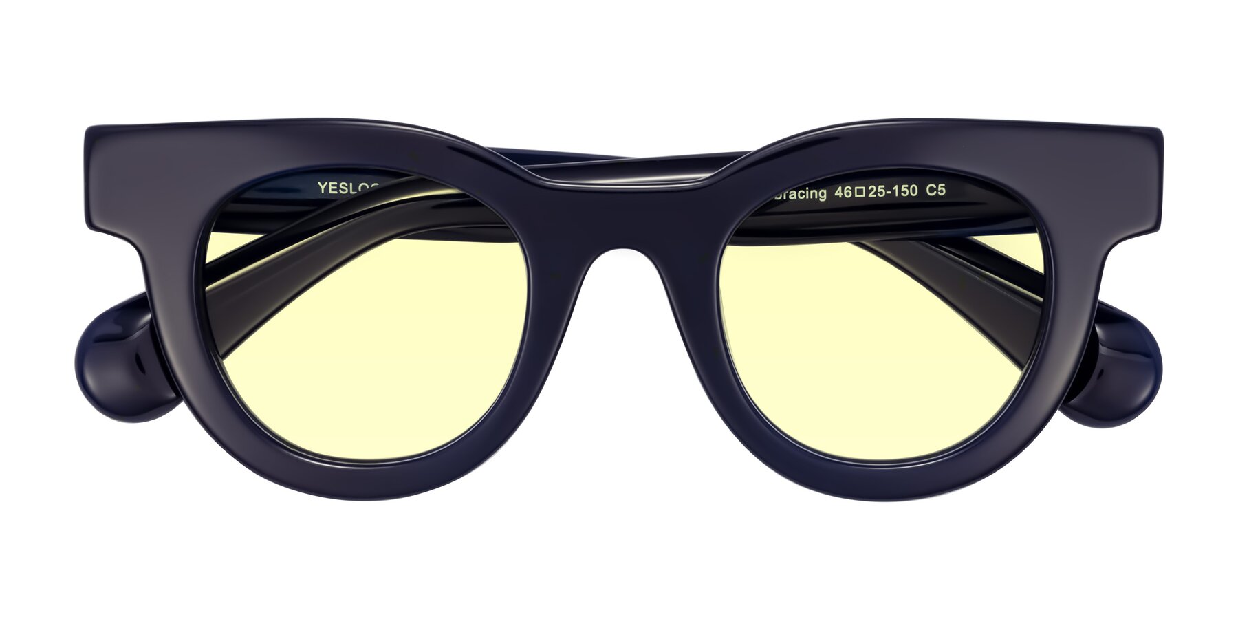 Folded Front of Embracing in Dark Navy with Light Yellow Tinted Lenses