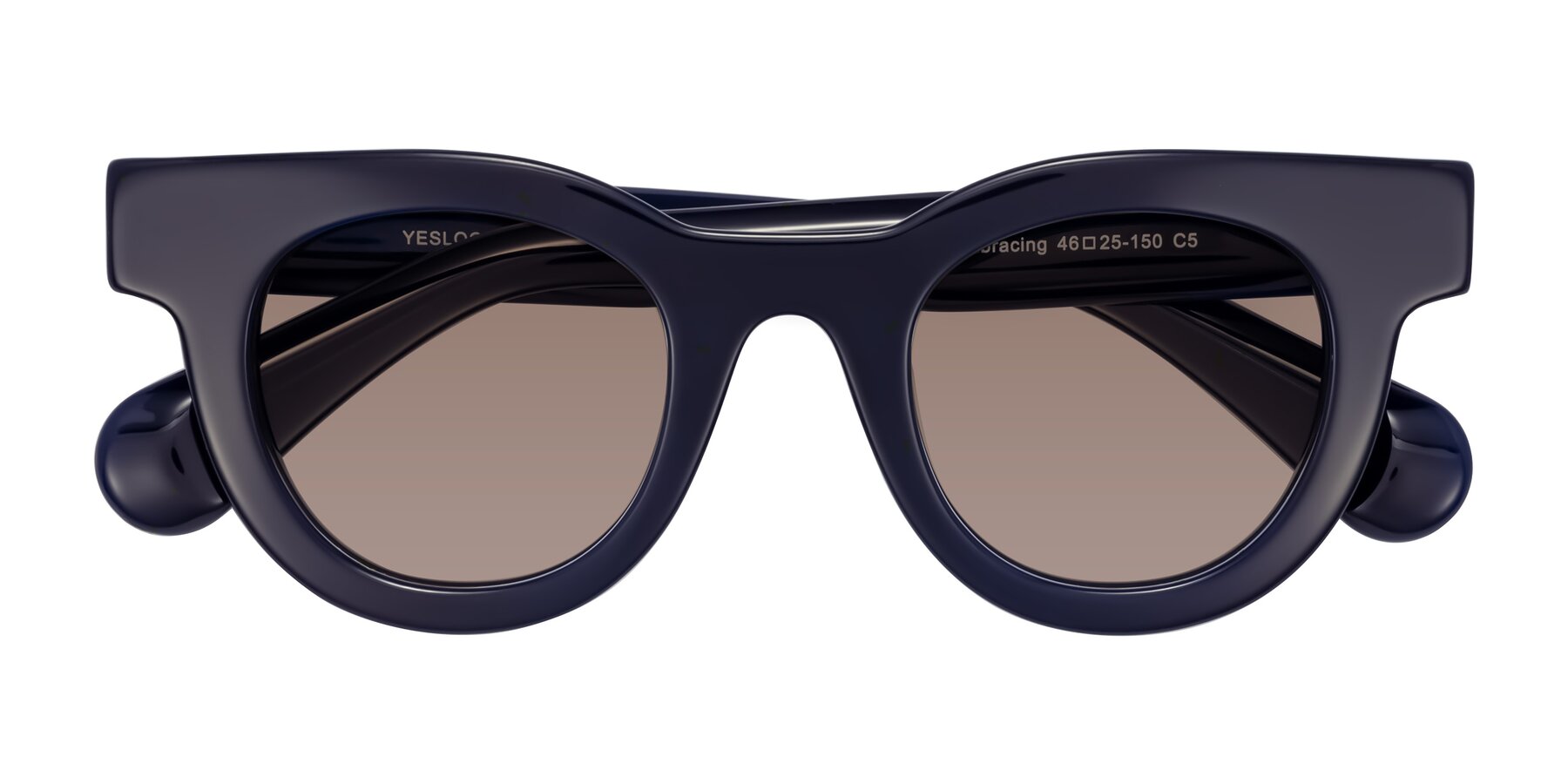 Folded Front of Embracing in Dark Navy with Medium Brown Tinted Lenses