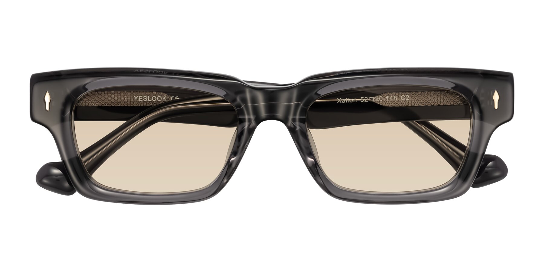 Folded Front of Xallon in Transparent Gray with Light Brown Tinted Lenses