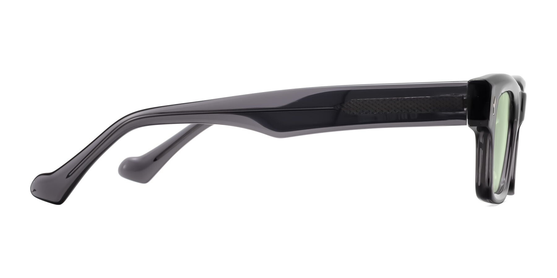 Side of Xallon in Transparent Gray with Light Green Tinted Lenses