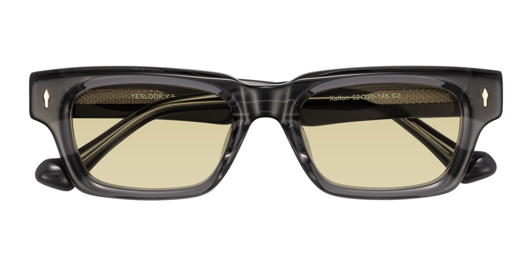 Folded Front of Xallon in Transparent Gray with Light Champagne Tinted Lenses