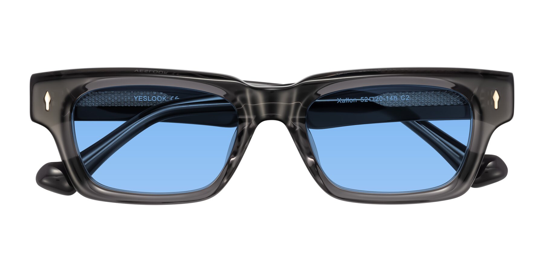 Folded Front of Xallon in Transparent Gray with Medium Blue Tinted Lenses