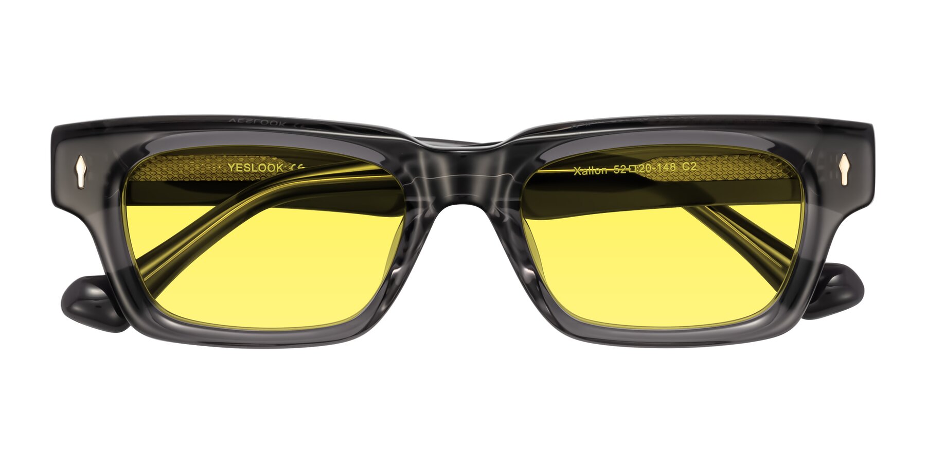 Folded Front of Xallon in Transparent Gray with Medium Yellow Tinted Lenses