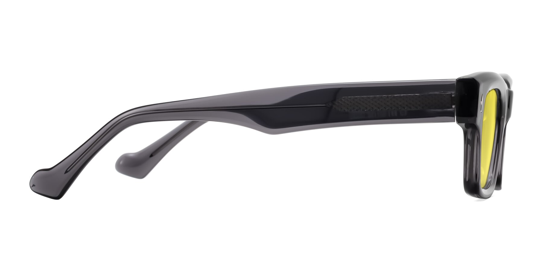 Side of Xallon in Transparent Gray with Medium Yellow Tinted Lenses