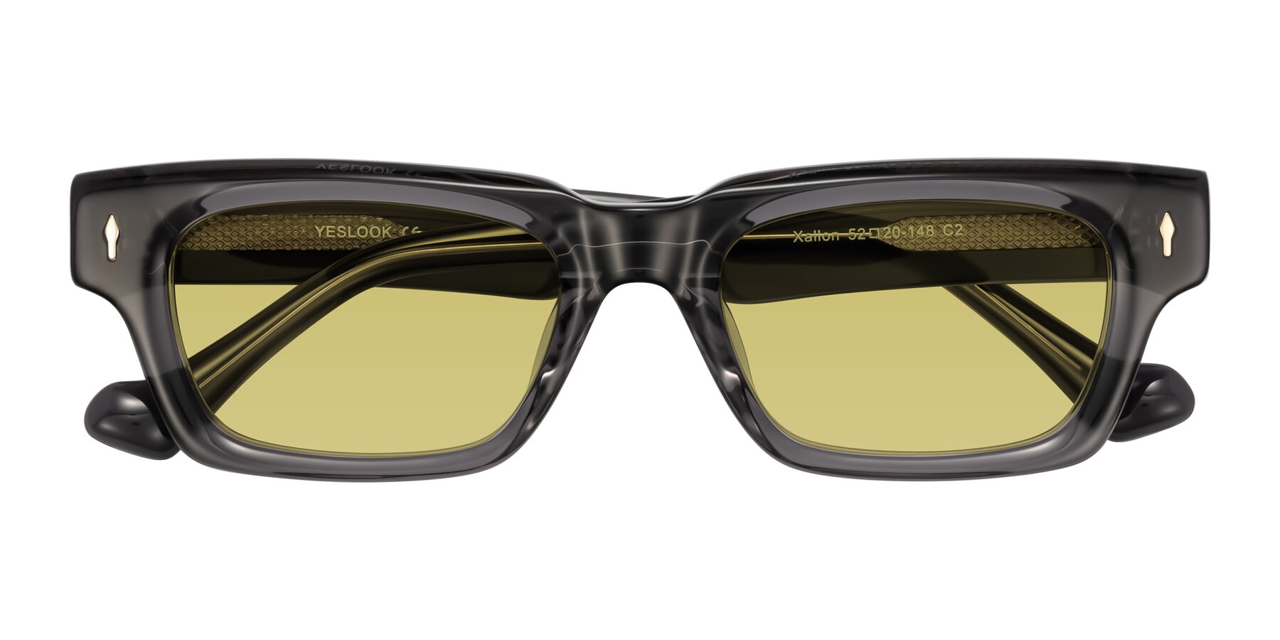 Folded Front of Xallon in Transparent Gray with Medium Champagne Tinted Lenses