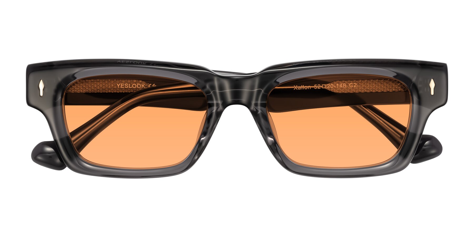 Folded Front of Xallon in Transparent Gray with Medium Orange Tinted Lenses