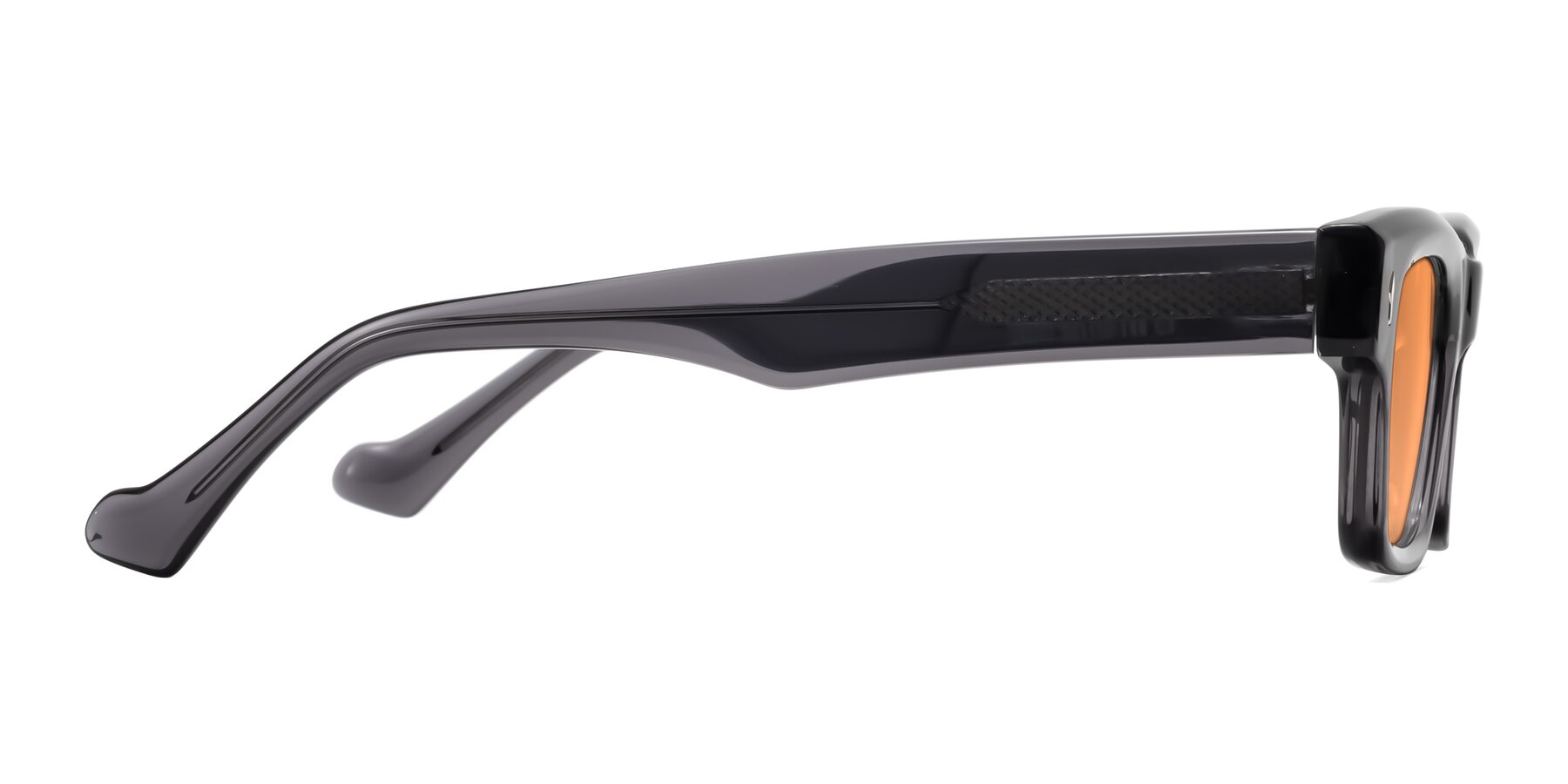 Side of Xallon in Transparent Gray with Medium Orange Tinted Lenses