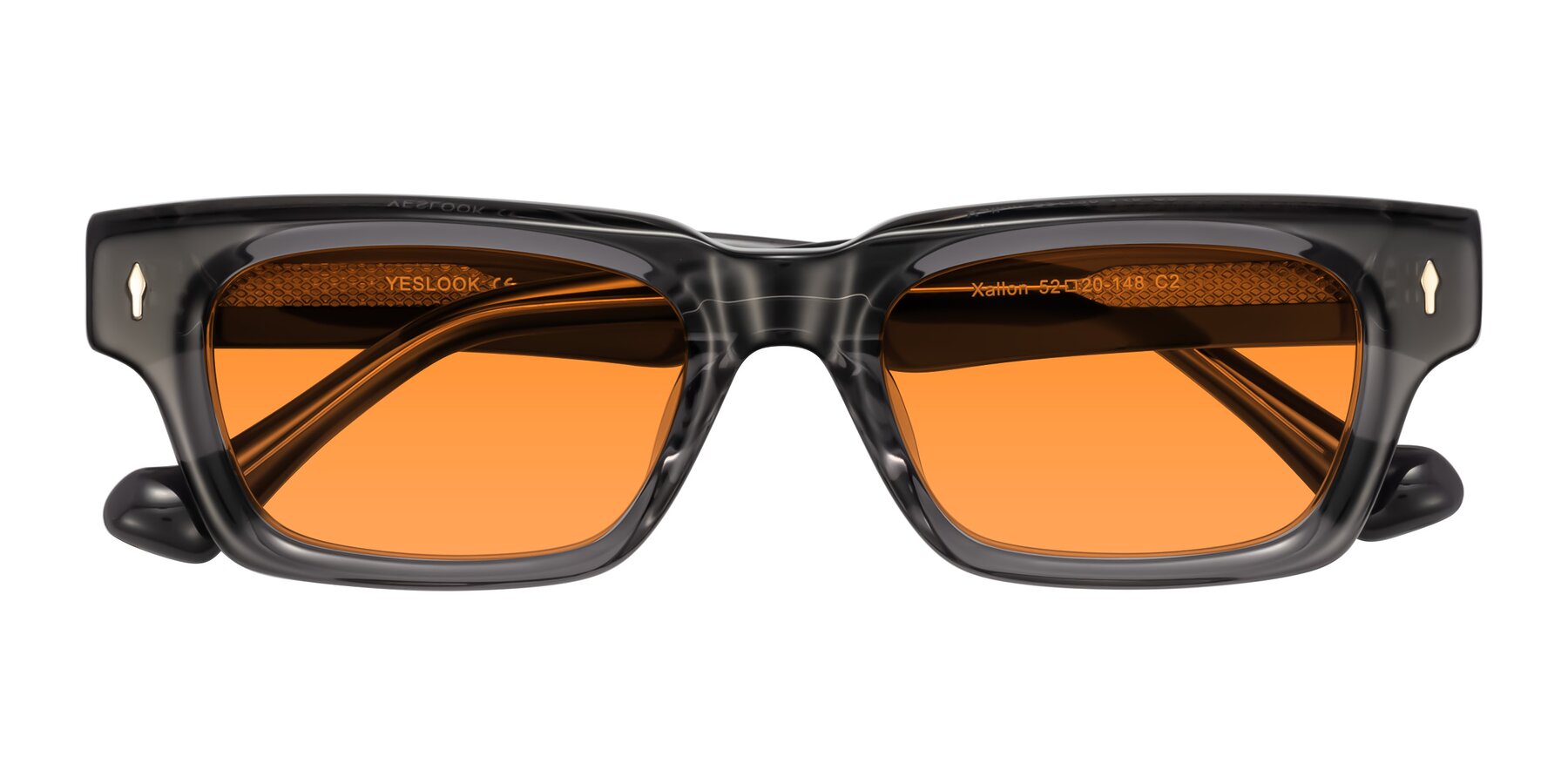 Folded Front of Xallon in Transparent Gray with Orange Tinted Lenses