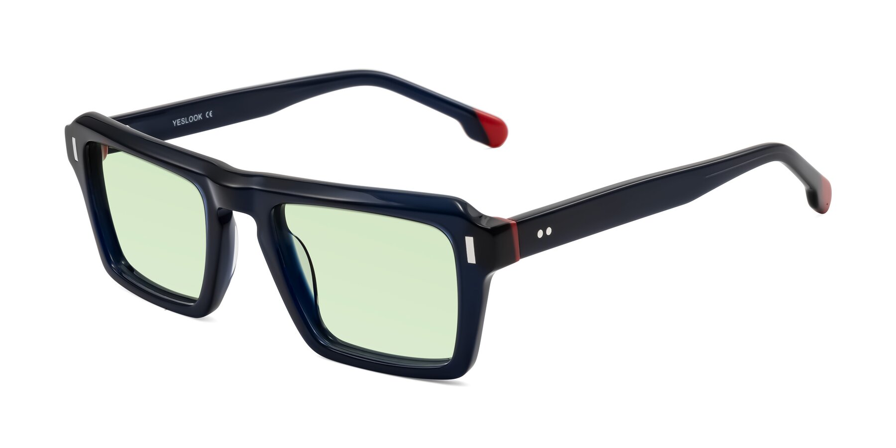 Angle of Sloan in Dark Navy with Light Green Tinted Lenses