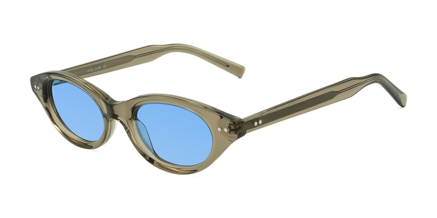 Angle of Mitri in Transparent Warm Olive with Medium Blue Tinted Lenses