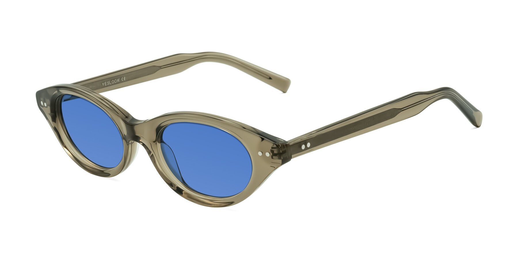 Angle of Mitri in Transparent Warm Olive with Blue Tinted Lenses