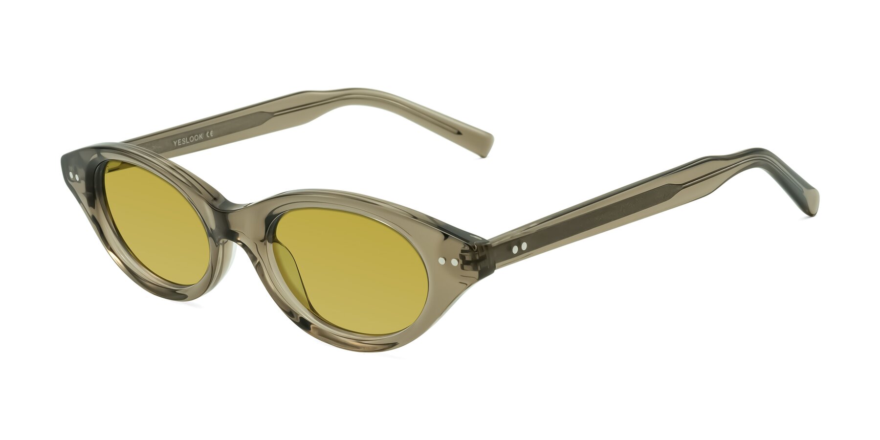 Angle of Mitri in Transparent Warm Olive with Champagne Tinted Lenses