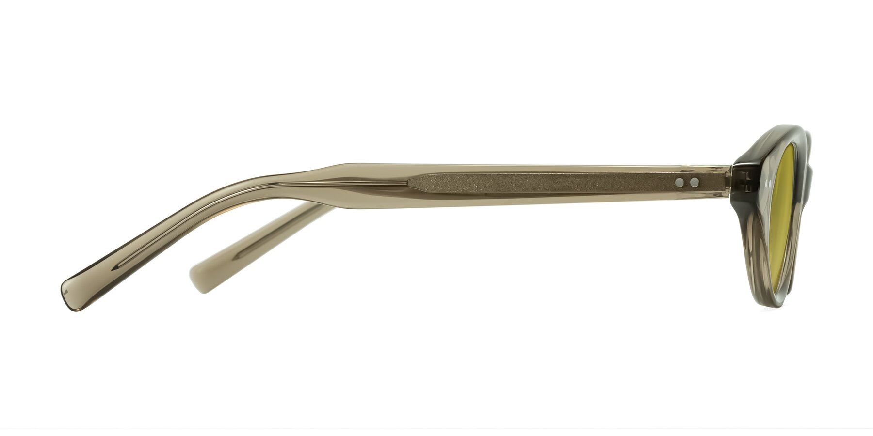 Side of Mitri in Transparent Warm Olive with Champagne Tinted Lenses