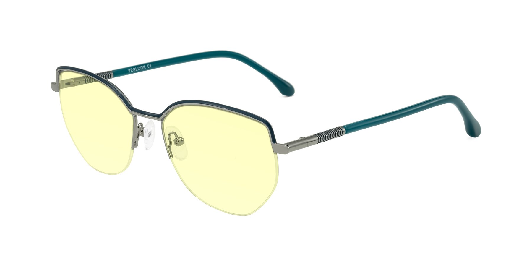 Angle of Heenan in Teal/Silver with Light Yellow Tinted Lenses