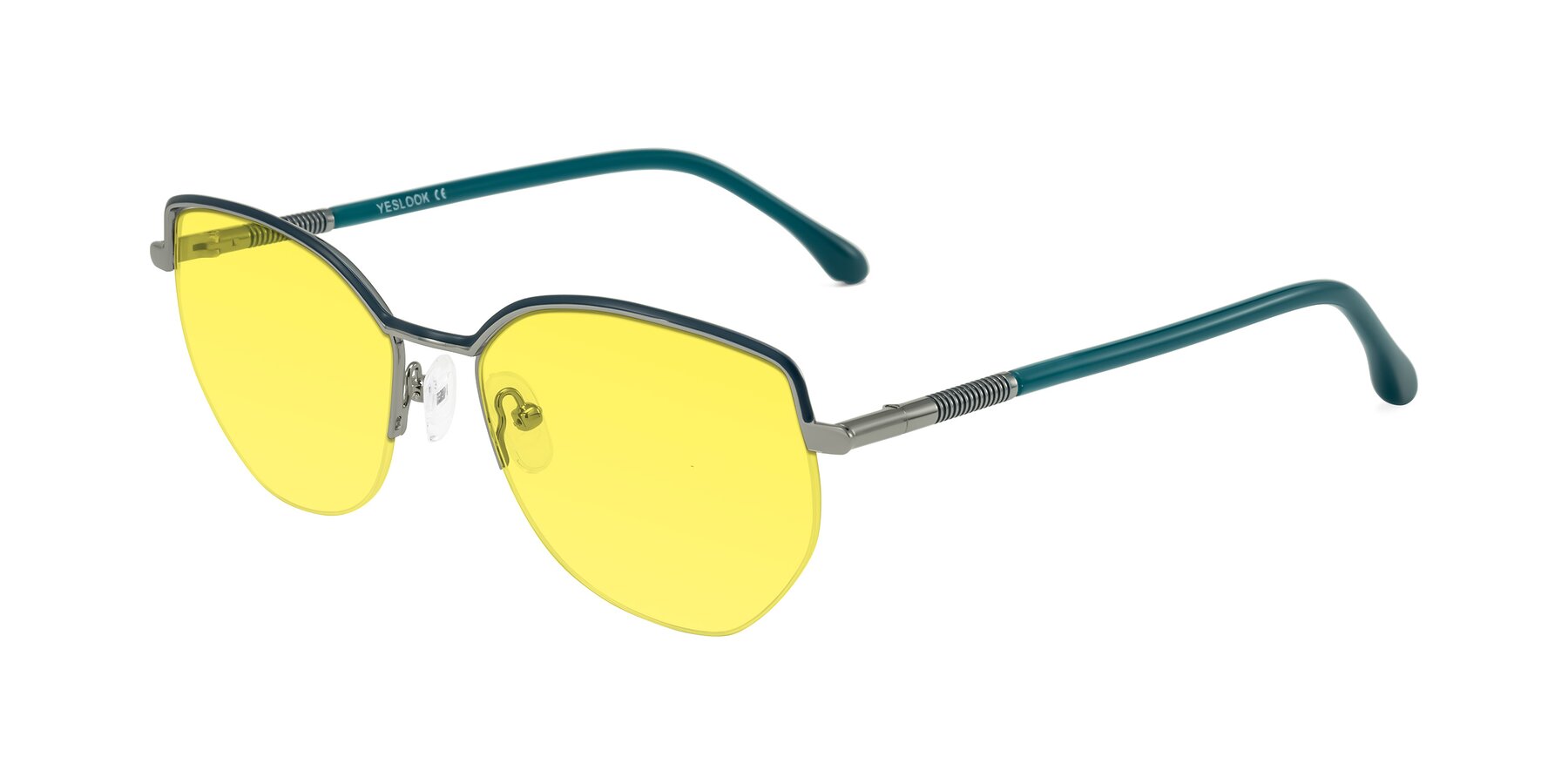 Angle of Heenan in Teal/Silver with Medium Yellow Tinted Lenses
