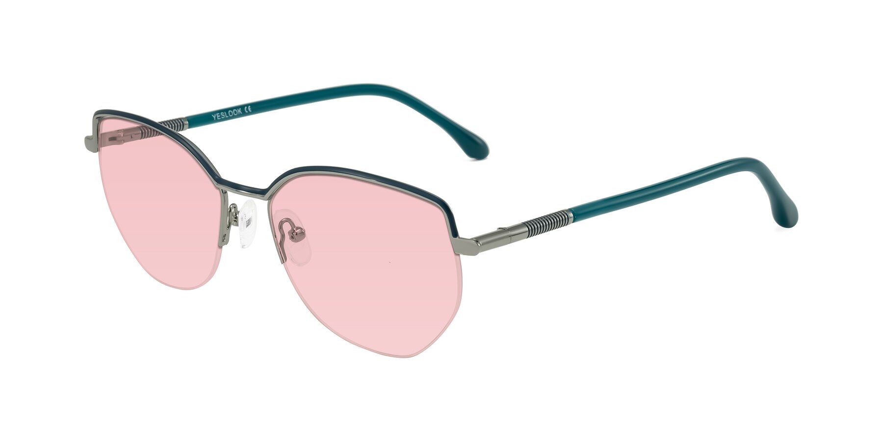 Angle of Heenan in Teal/Silver with Light Garnet Tinted Lenses