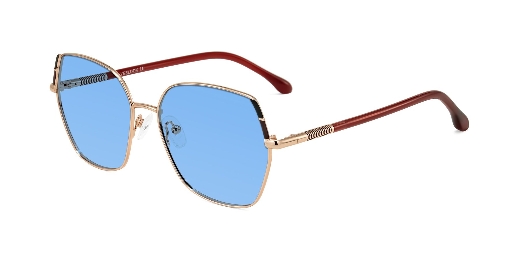 Angle of Suarie in Rose Gold/Red with Medium Blue Tinted Lenses