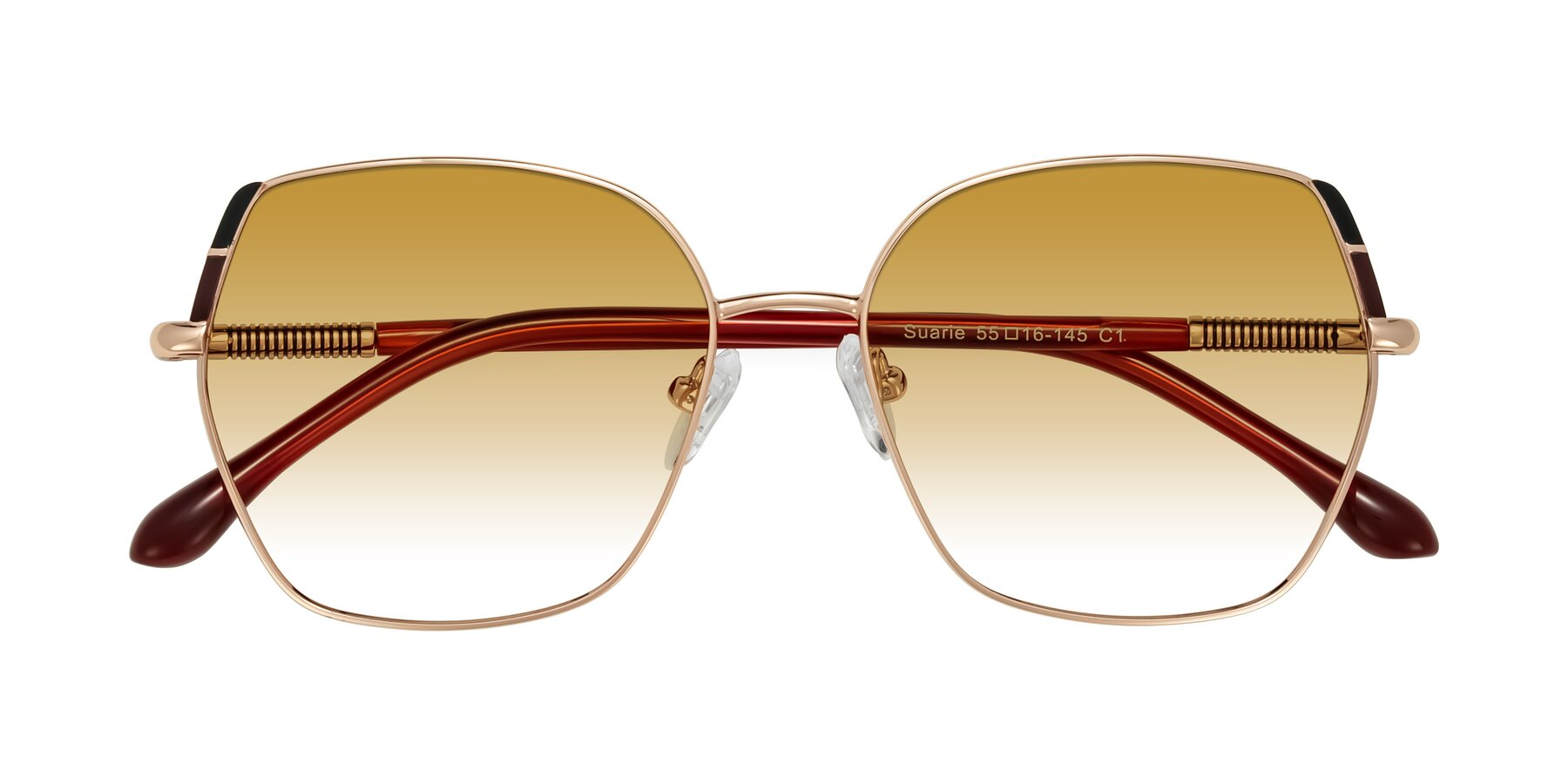 Folded Front of Suarie in Rose Gold/Red with Champagne Gradient Lenses