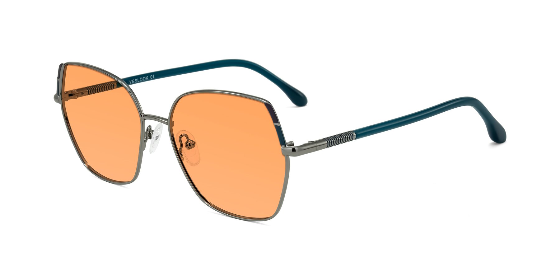 Angle of Suarie in Gunmetal/Teal with Medium Orange Tinted Lenses