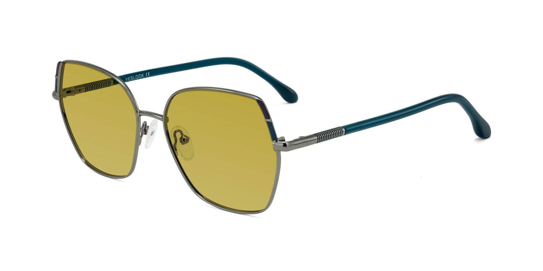 Angle of Suarie in Gunmetal/Teal with Champagne Tinted Lenses