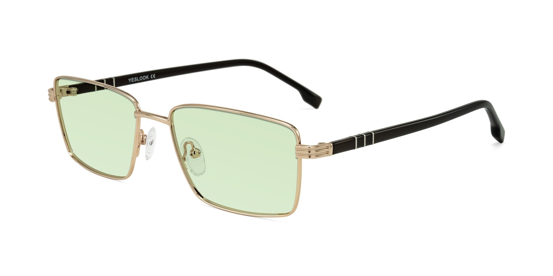 Angle of Raiyah in Gold/Dark Brown with Light Green Tinted Lenses