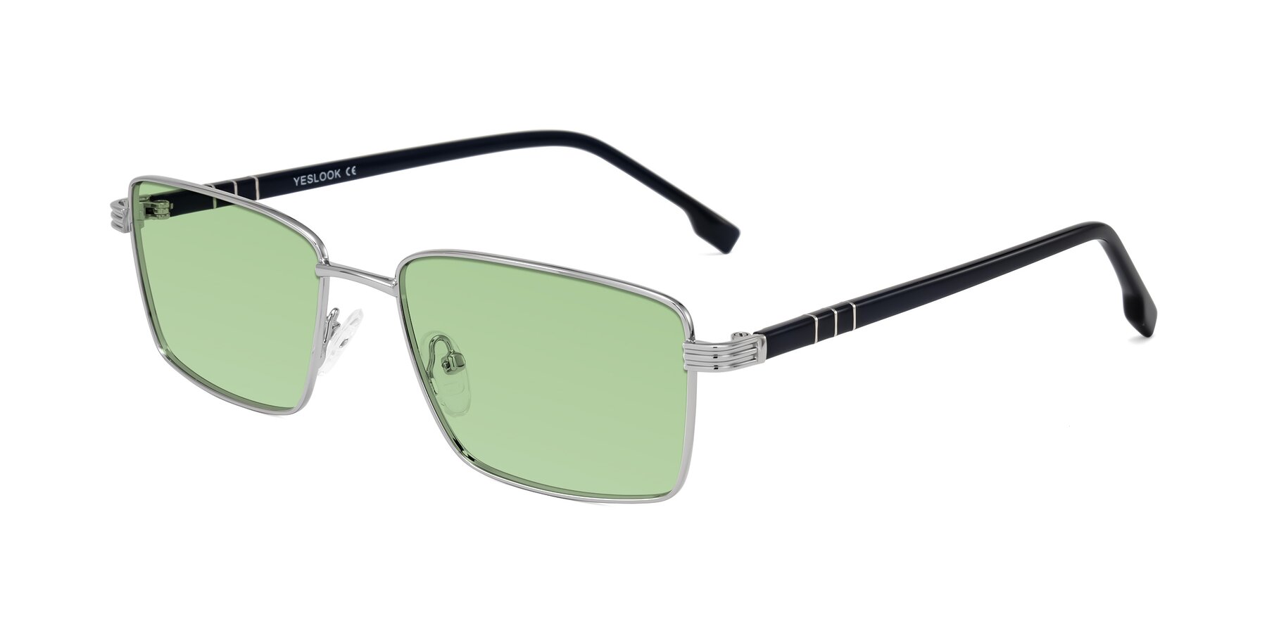 Angle of Raiyah in Silver/Dark Blue with Medium Green Tinted Lenses