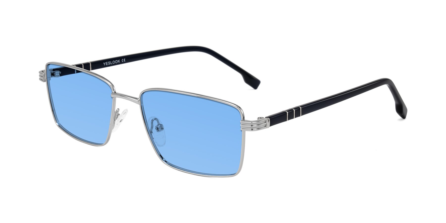Angle of Raiyah in Silver/Dark Blue with Medium Blue Tinted Lenses