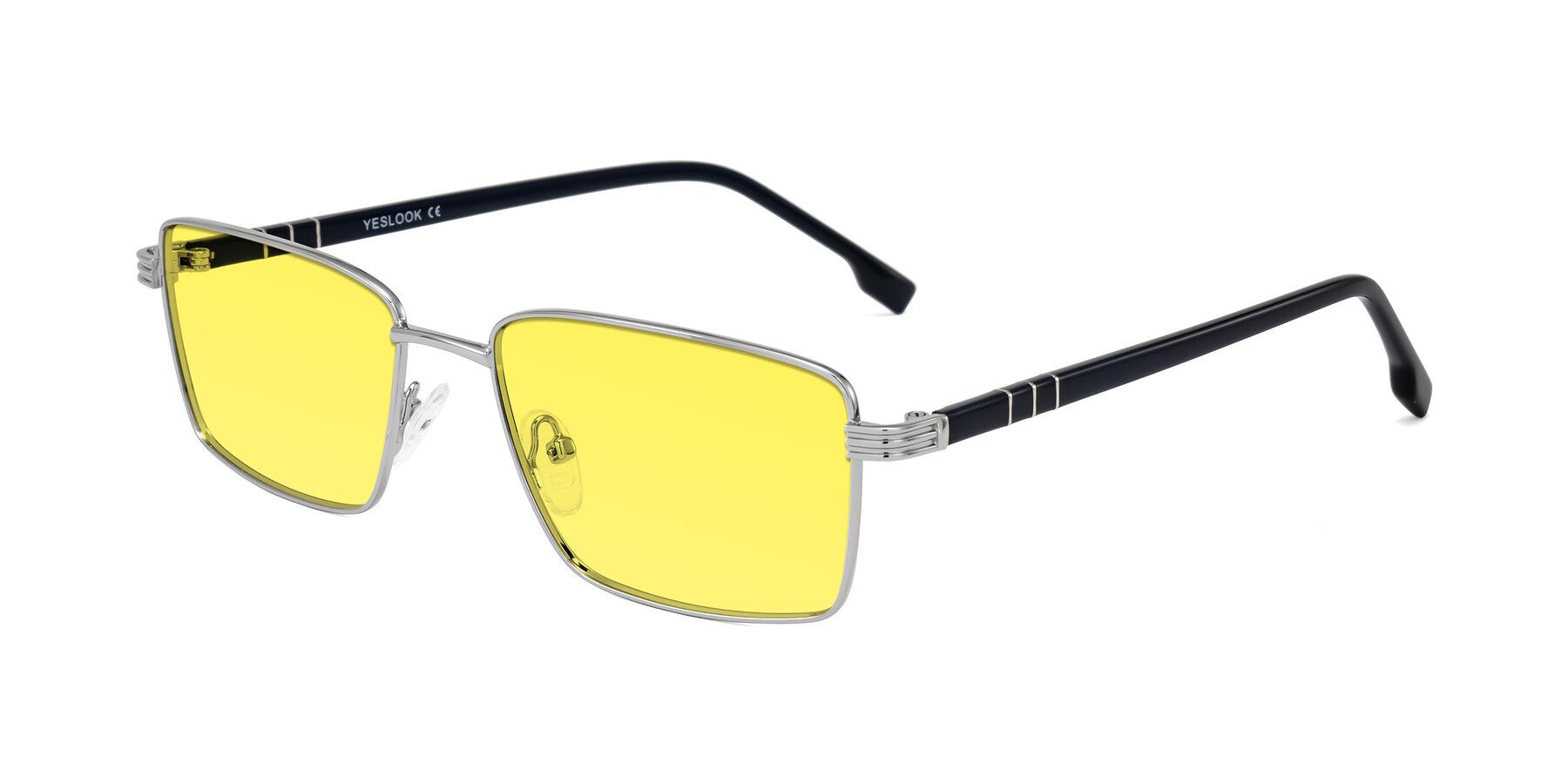 Angle of Raiyah in Silver/Dark Blue with Medium Yellow Tinted Lenses