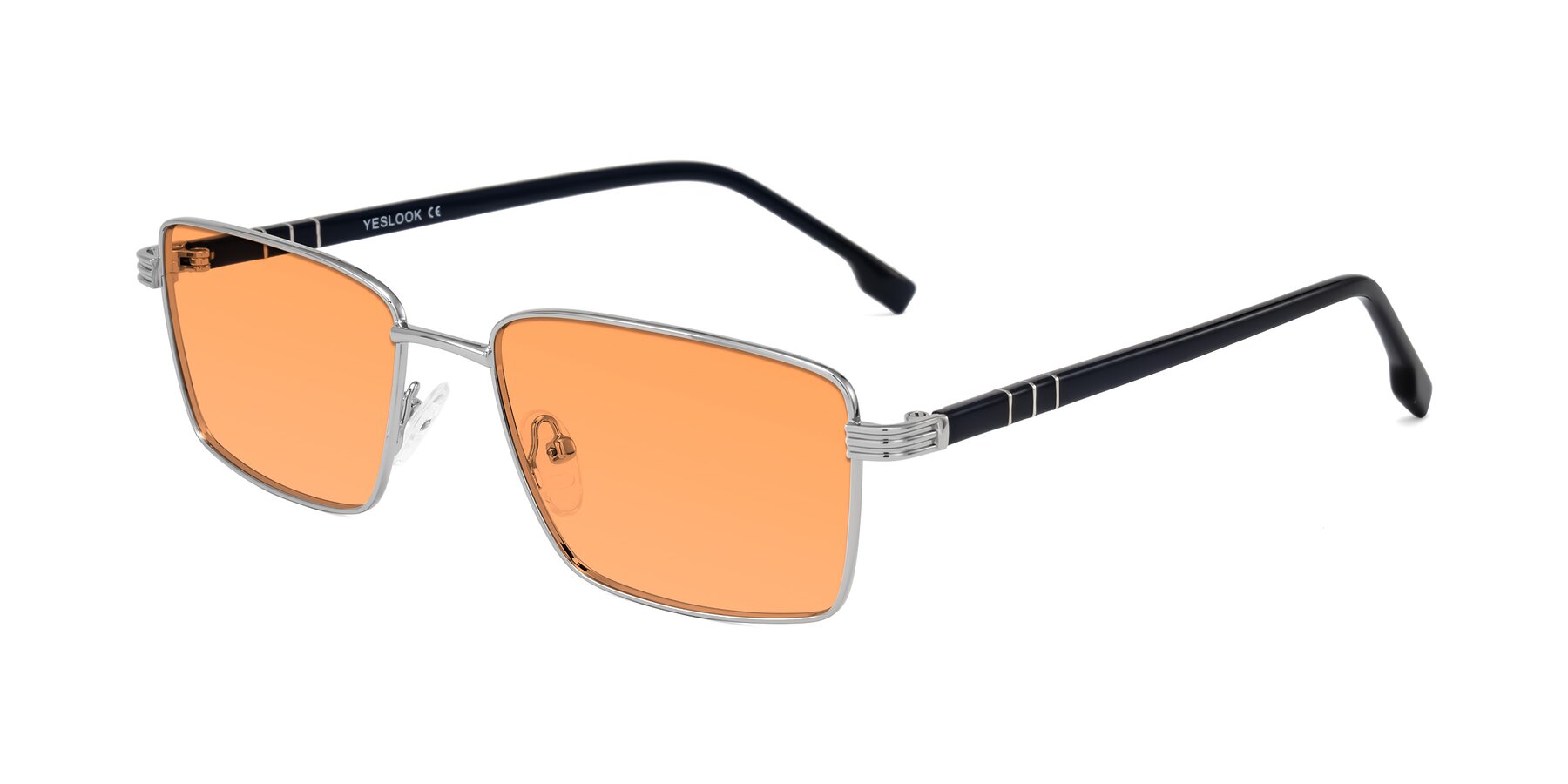 Angle of Raiyah in Silver/Dark Blue with Medium Orange Tinted Lenses