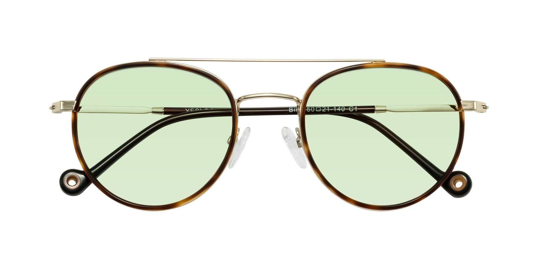 Folded Front of Biko in Tortoise/Gold with Light Green Tinted Lenses