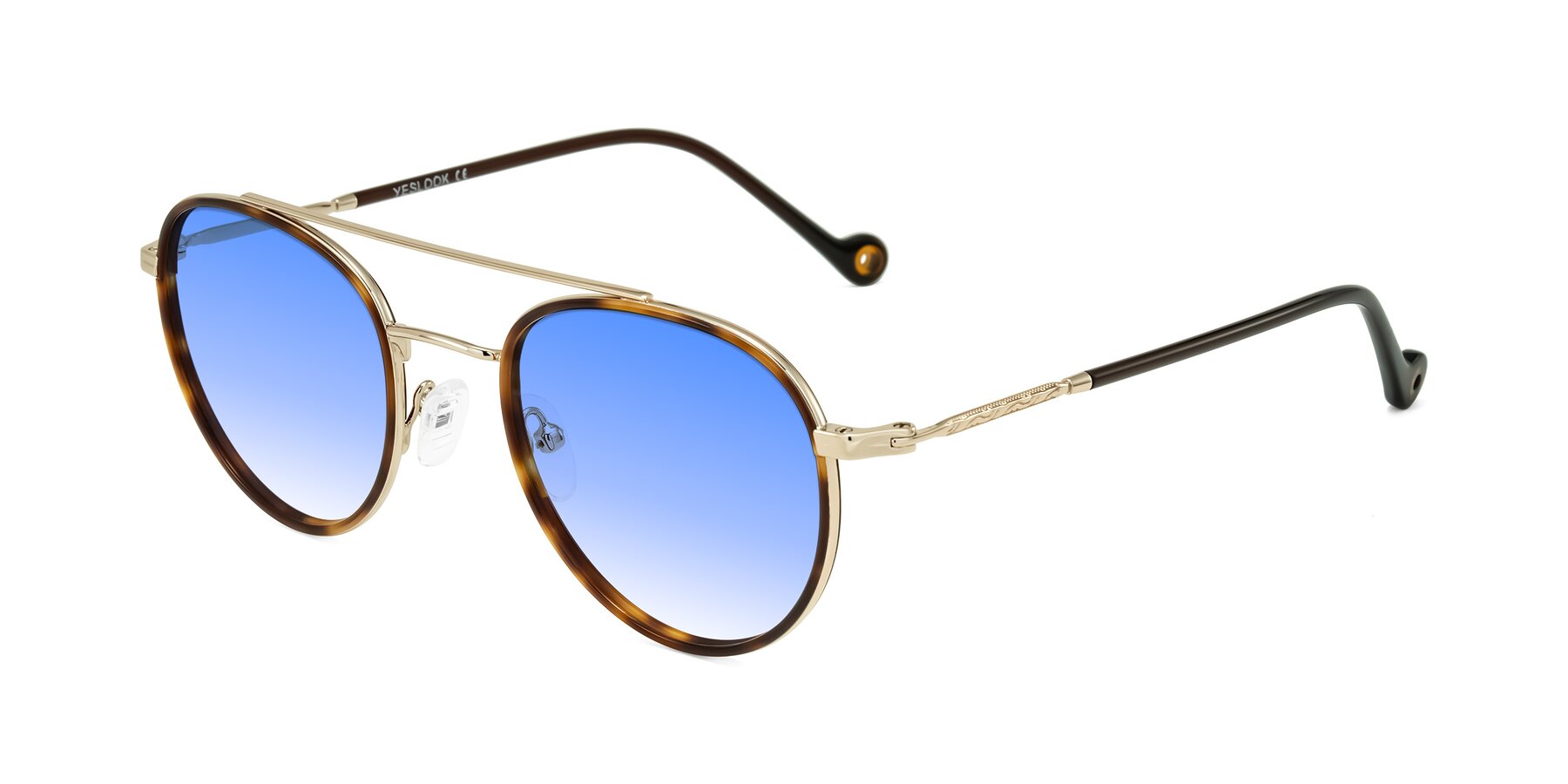 Angle of Biko in Tortoise/Gold with Blue Gradient Lenses