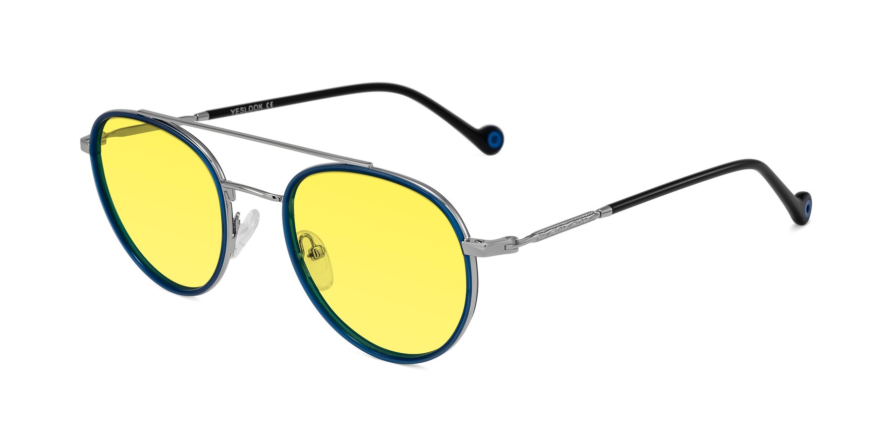 Angle of Biko in Blue/Silver with Medium Yellow Tinted Lenses