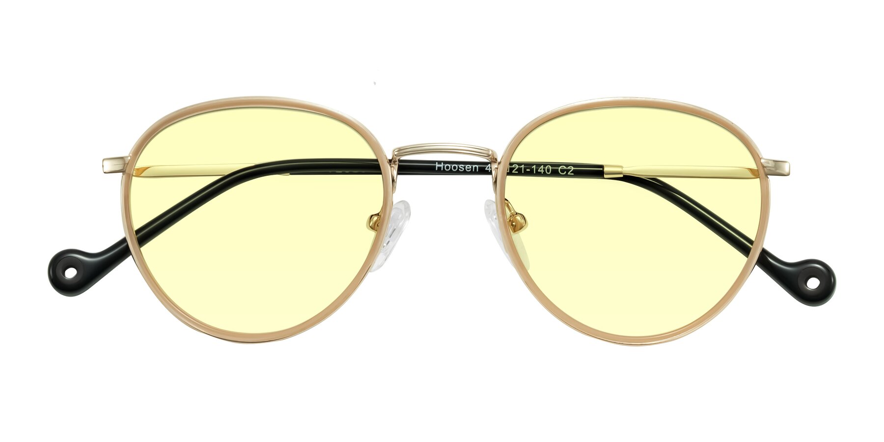 Folded Front of Hoosen in Beige/Gold with Light Yellow Tinted Lenses