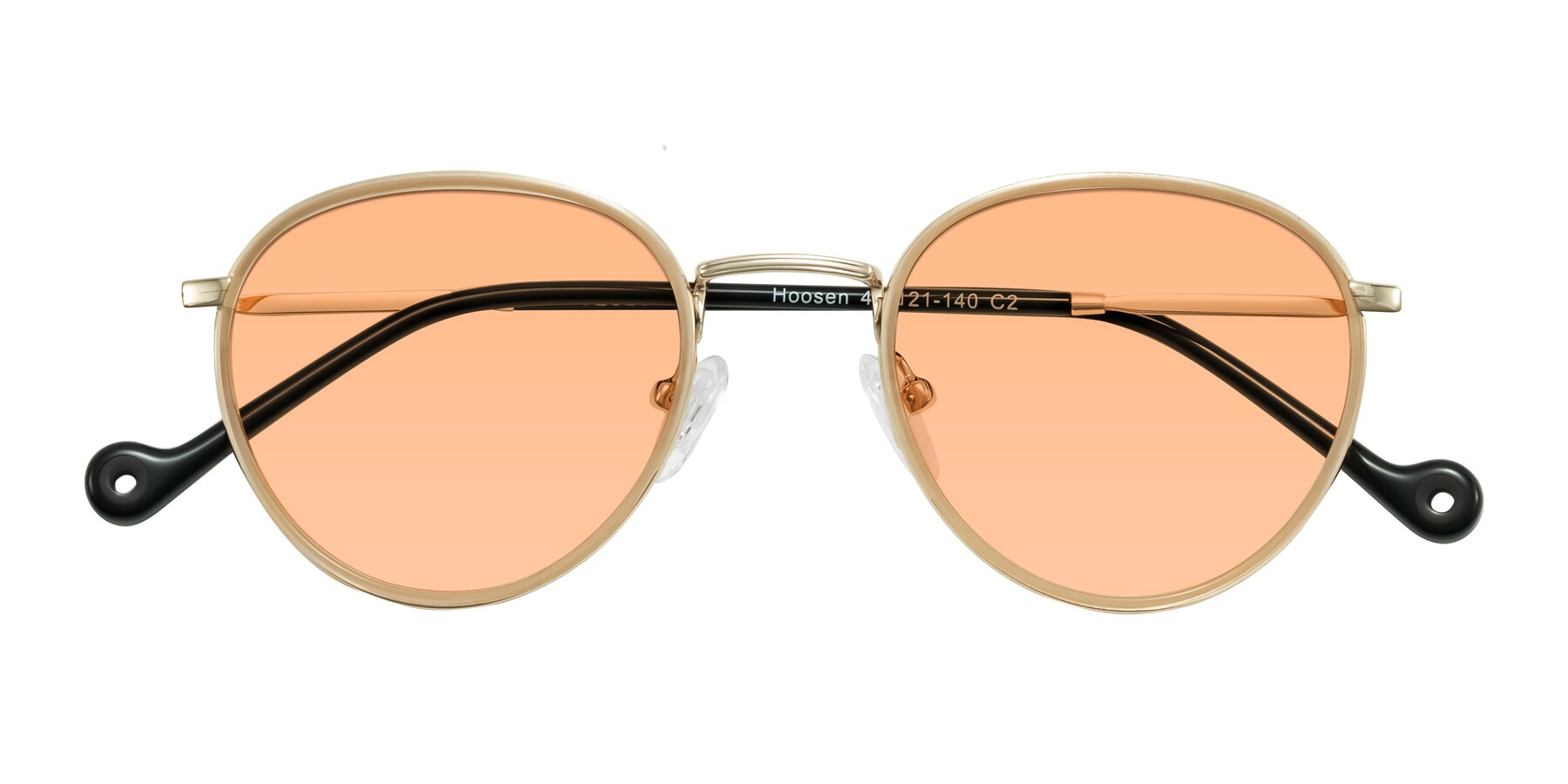 Folded Front of Hoosen in Beige/Gold with Light Orange Tinted Lenses