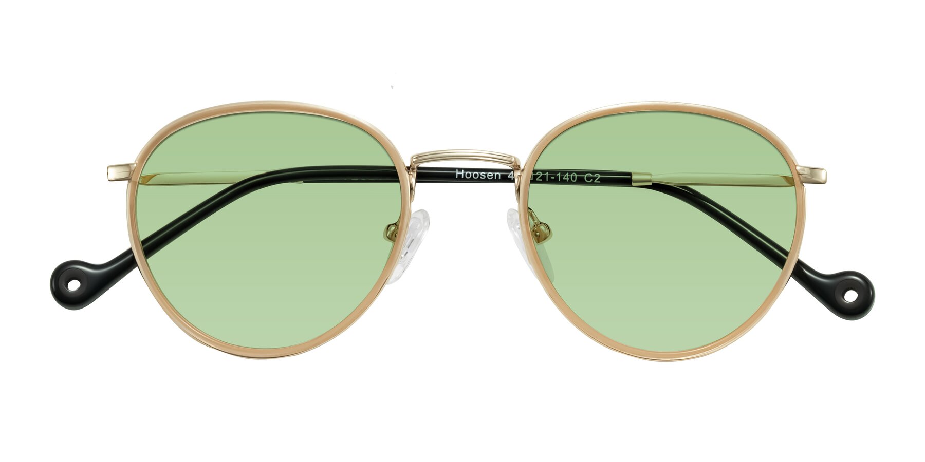 Folded Front of Hoosen in Beige/Gold with Medium Green Tinted Lenses